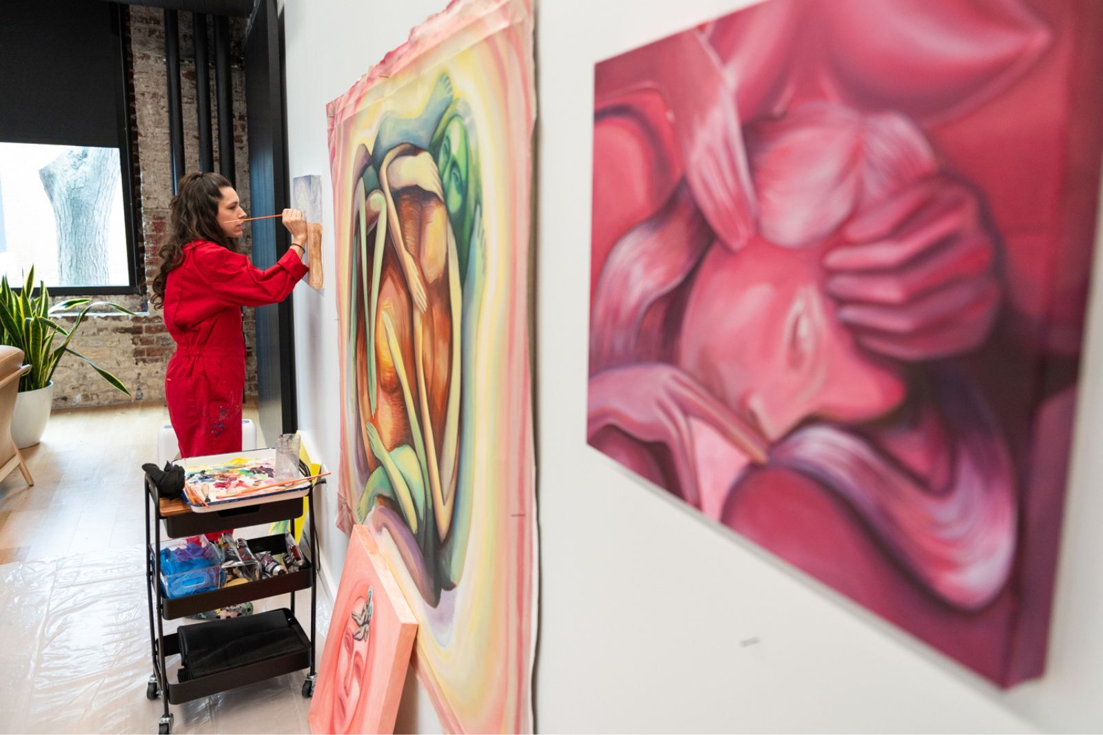 Alicia Reyes Mc Namara painting in the Kalie Baker Studio