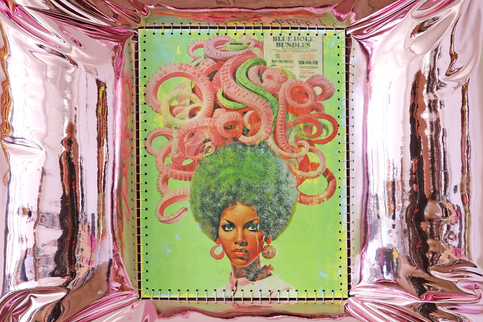 April Bey Happenings A composition featuring a black woman with an afro and on top of her head are pink octopus tentacles in an organic shape its frames by shiny metallic material