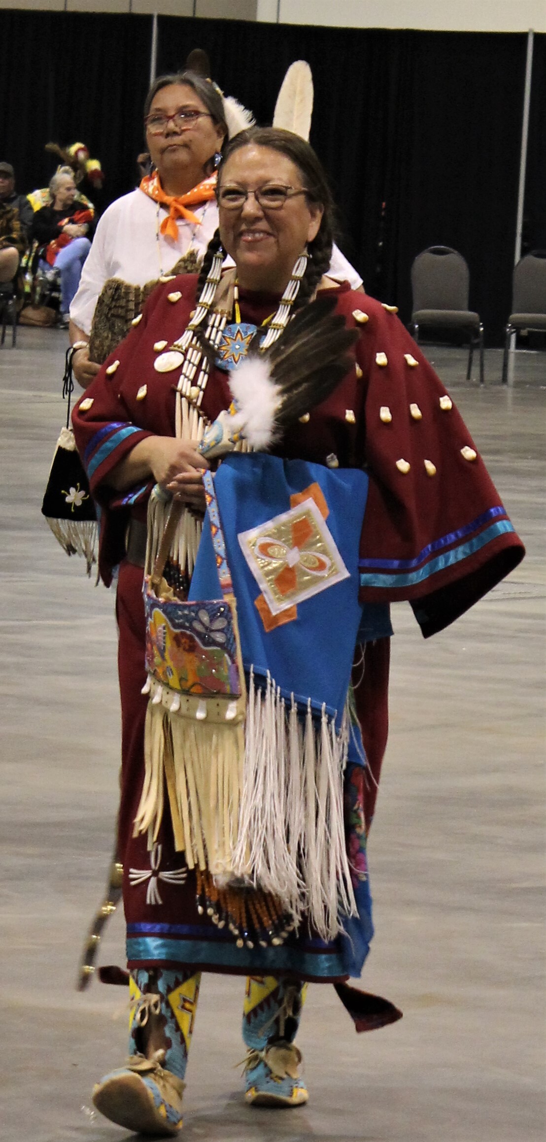 Populus Fund 2024 Grantee Valery Killscrow Copeland shes wearing Native American regalia and smiling at the camera